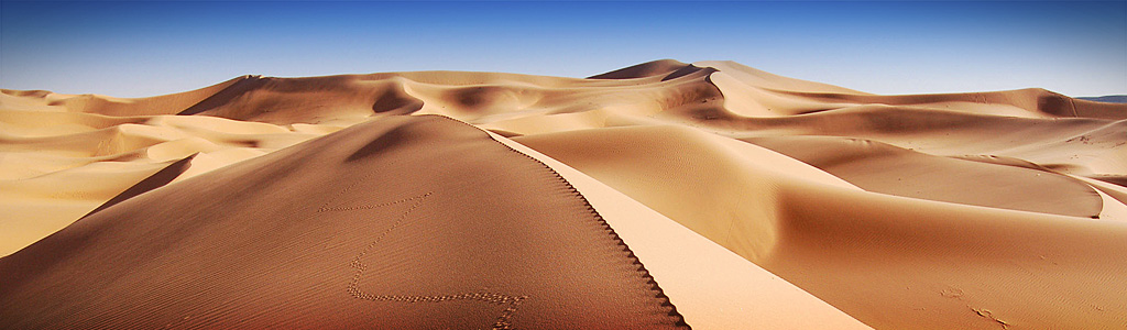 Morocco desert tours: Sahara dunes of Erg Chebbi at sunset
